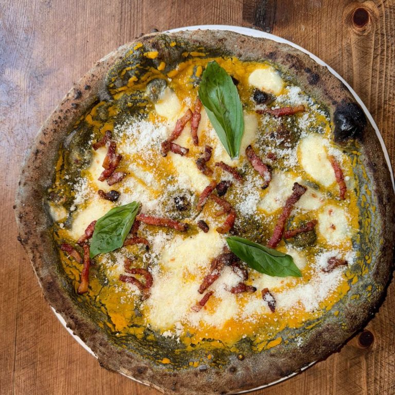 Fresh burrata with ripe tomatoes and basil at Amore & Limoncello, Fulham