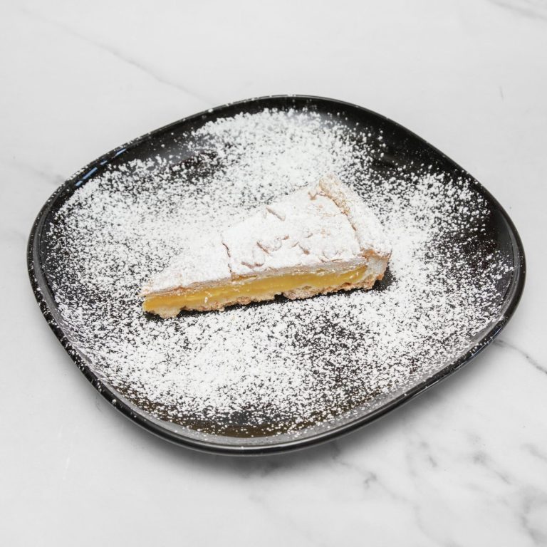 Torta della Nonna – traditional Italian custard tart with pine nuts and icing sugar in Fulham