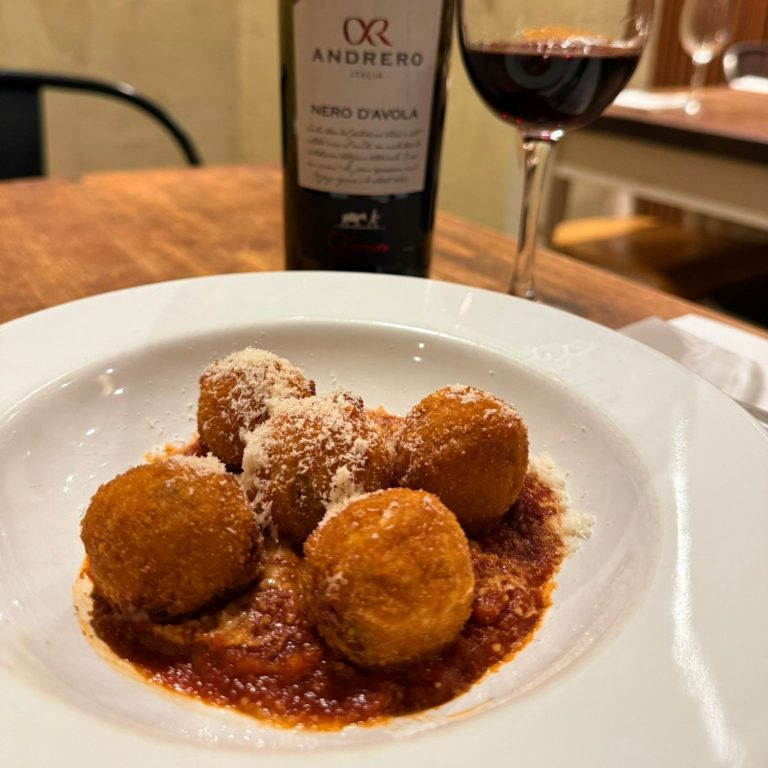 Golden crispy arancini – Italian rice balls with a rich filling at Amore & Limoncello, Fulham